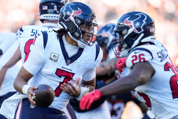 C.J. Stroud rolls out in the second quarter of the NFL Week 10 game between the Cincinnati Bengals and the Texans